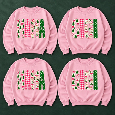 Coquette Christmas family title sweatshirt with Christmas trees, Santa accents and bows inside the letters