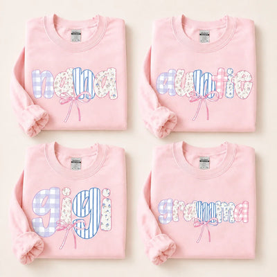 Personalized family name sweatshirt with pastel patchwork letters and a pink coquette bow