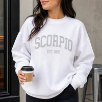 [Custom EST Year or Not EST] Custom Zodiac Sweatshirt, Personalized Star Sign Crewneck, White Astrology Pullover, Vintage Varsity Horoscope Birthday Gift