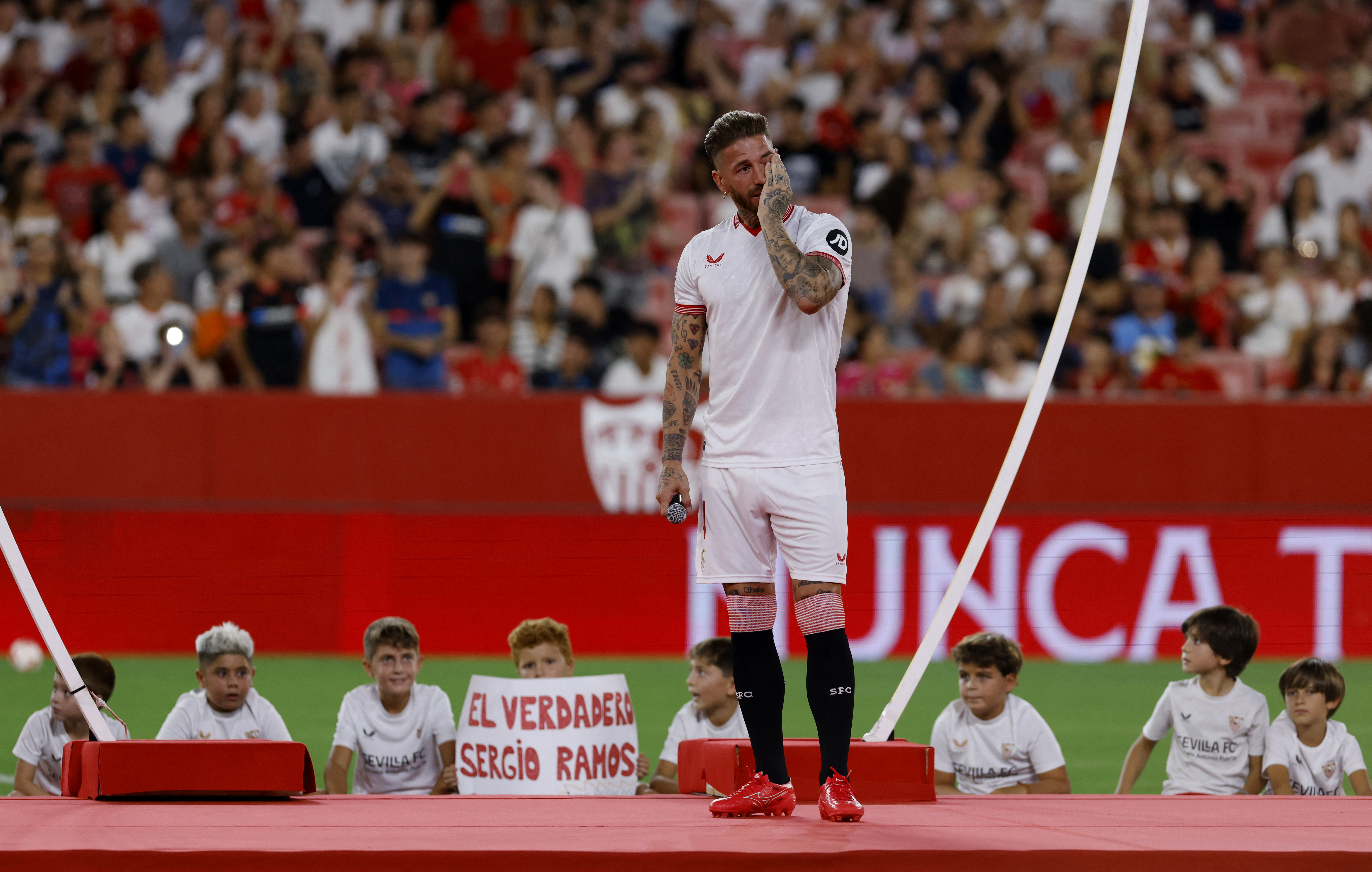 Sevilla president gets his wings at Ramos presentation | Reuters